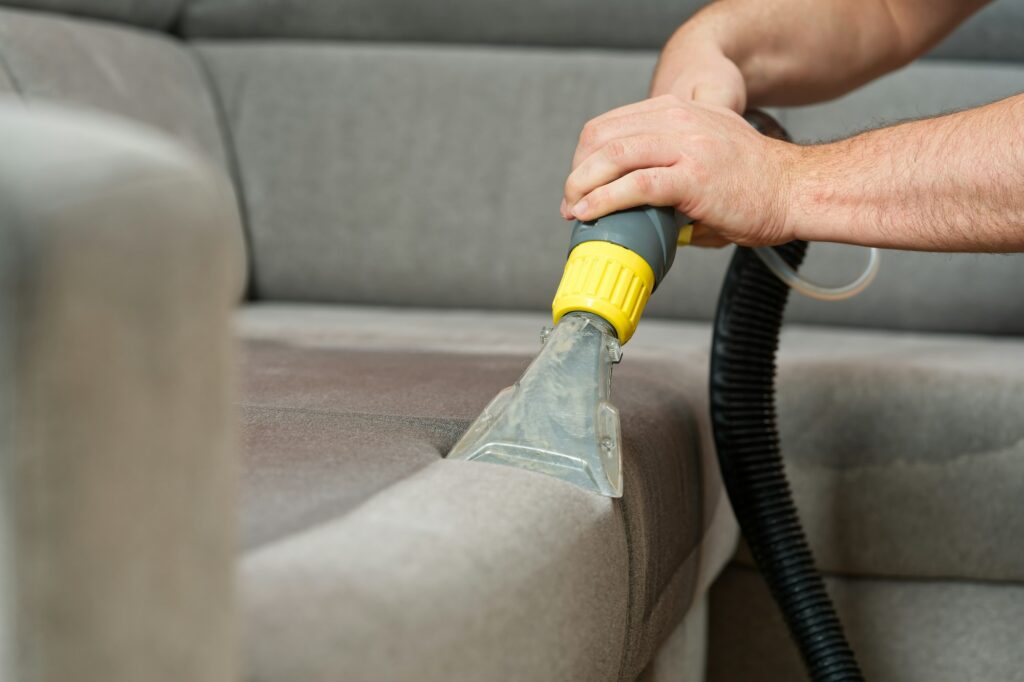 Sofa before and after wet - cleaning indoors. textile sofa vacuum cleaning