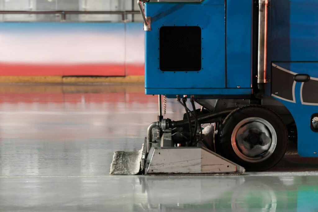 Special machine ice harvester cleaning the ice rink